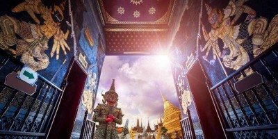 Travel concept, Giant statue at Temple Wat Pra Kaew, Grand Palace, Bangkok Thailand